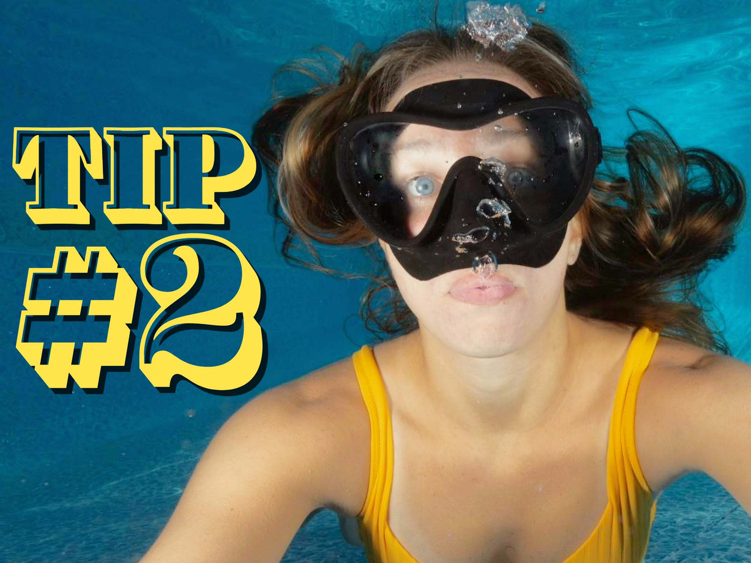 Ikelite Social Media Director Denise Pietsch underwater in a pool with snorkel mask
