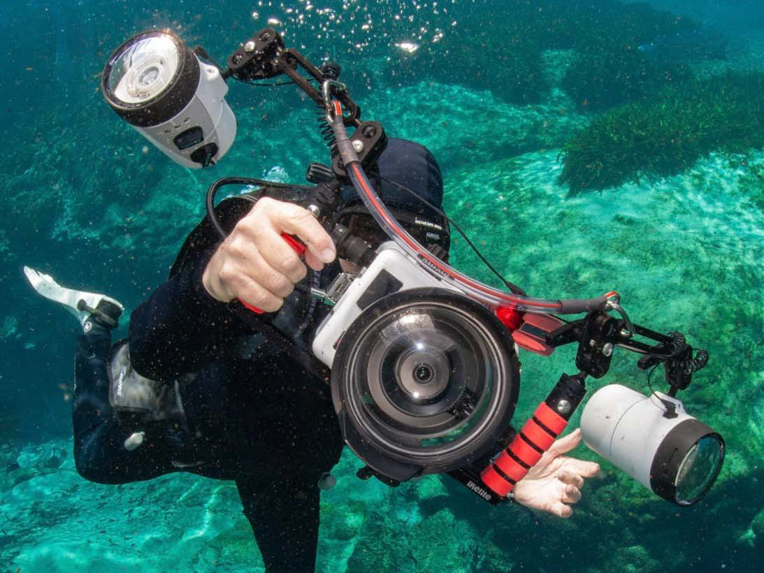 David Haas underwater with the Canon R100 inside an Ikelite 200DLM Underwater Housing paired with the new Ikelite RC165 Fiber Optic Strobes