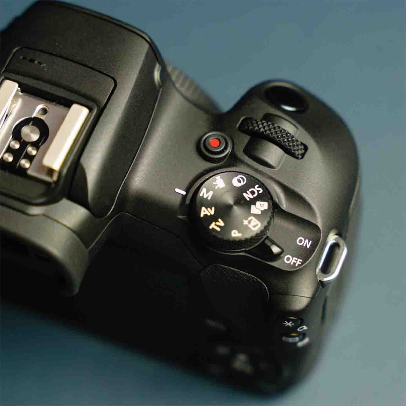 Canon EOS R100 Camera body exposure mode dial 