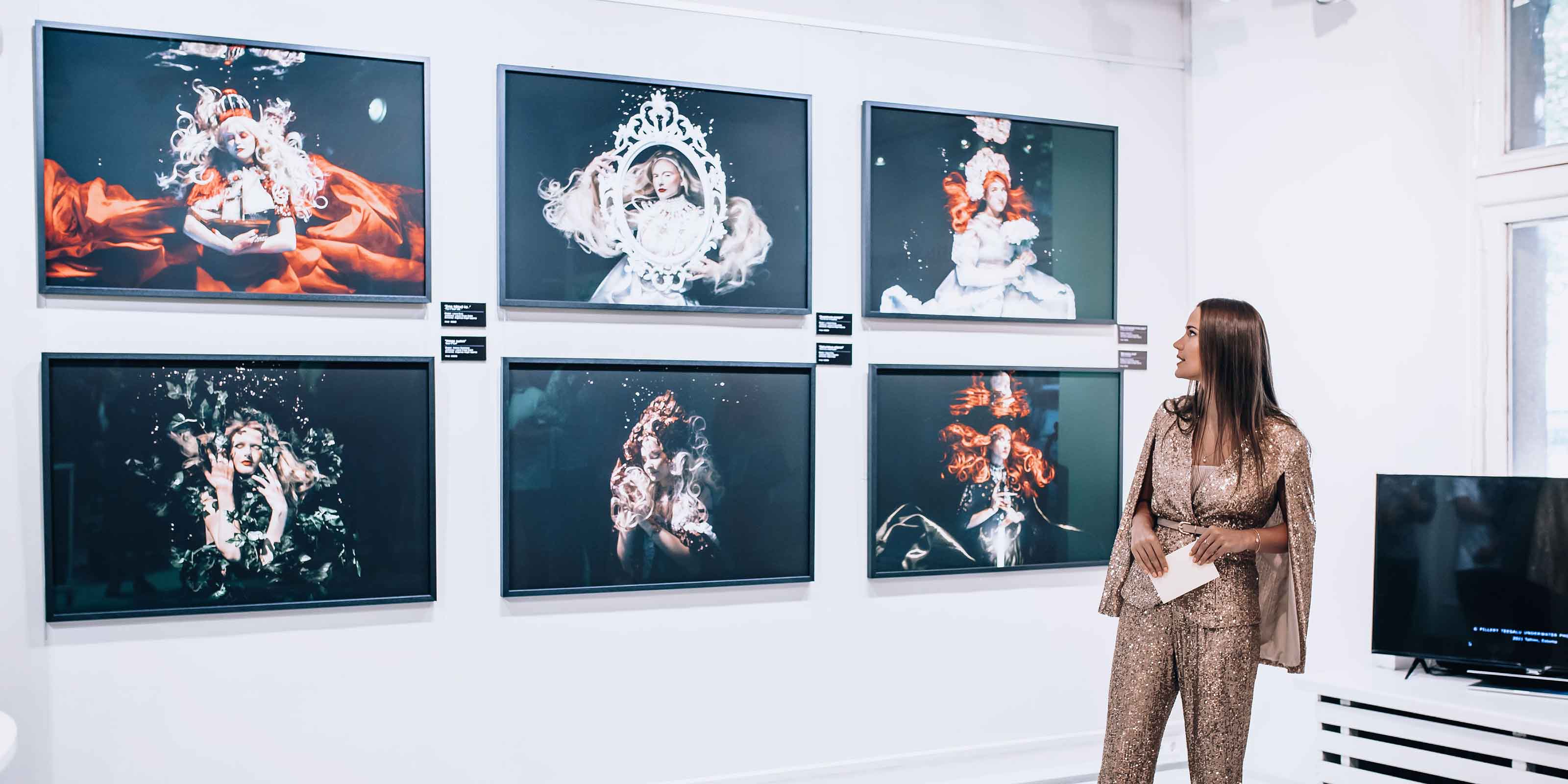 Underwater Photographer Pillery Teesalu at her gallery opening of underwater photos taken with Ikelite housing