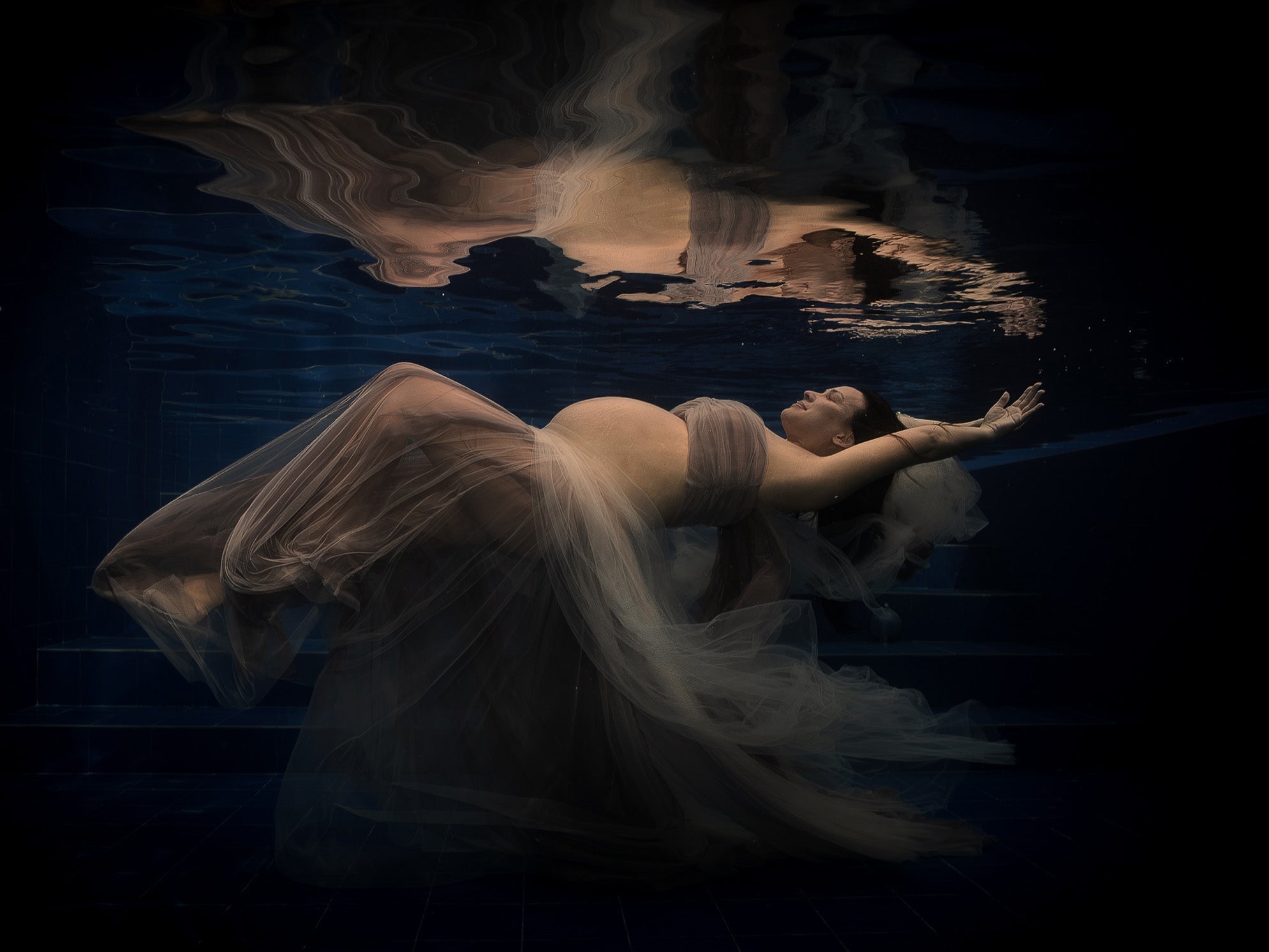 What a wildlife filmmaker learned from an underwater maternity photoshoot. Image by Claude Evangelista, taken with Sony a7S III inside an Ikelite underwater housing with dual Ikelite DS232 Strobes.