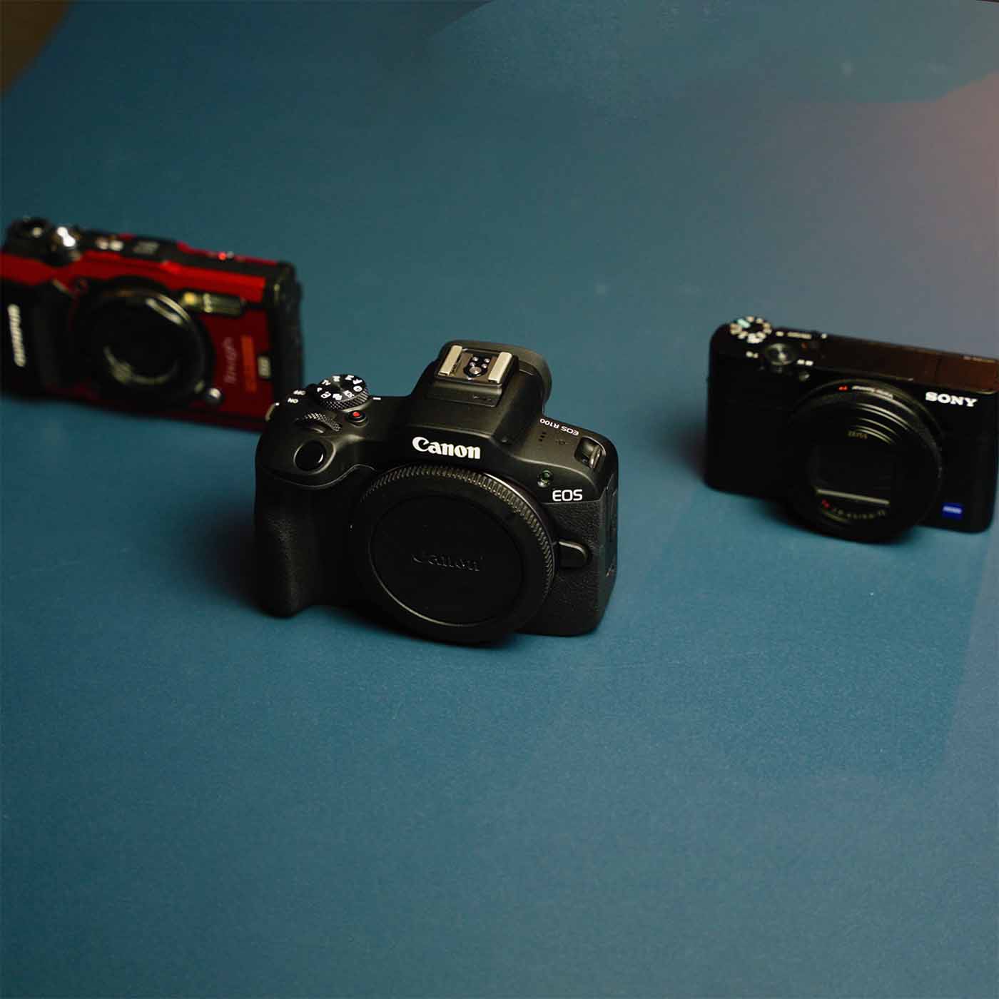 Canon EOS R100 Size comparison OM System TG-7 Sony RX100 VII