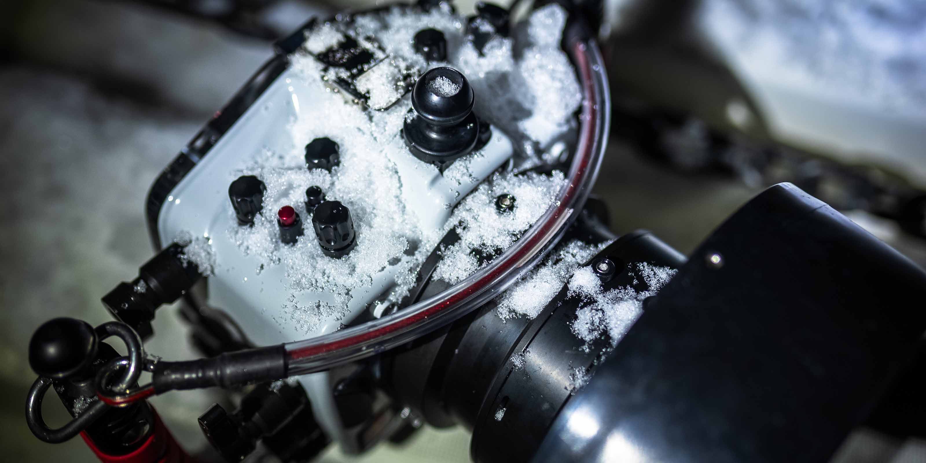 Ikelite Underwater Housing covered in snow in Norway
