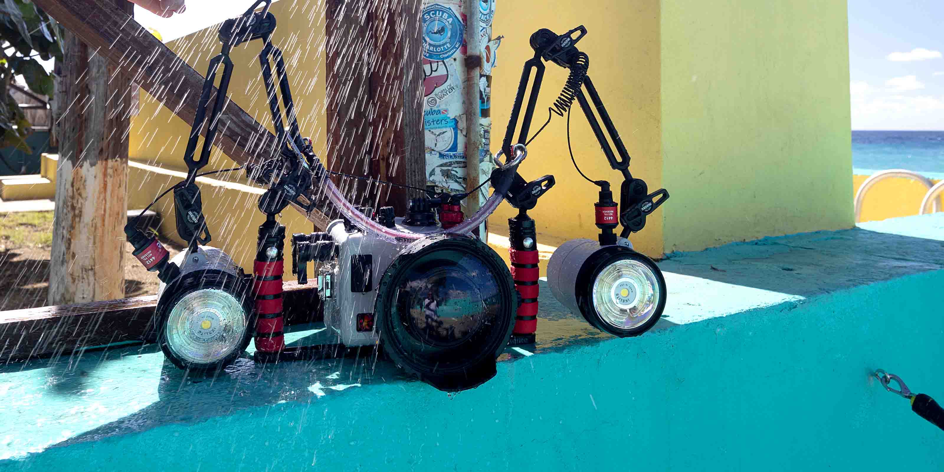 Ikelite Underwater Housing fresh water rinse in Grand Cayman at Sunset Divers